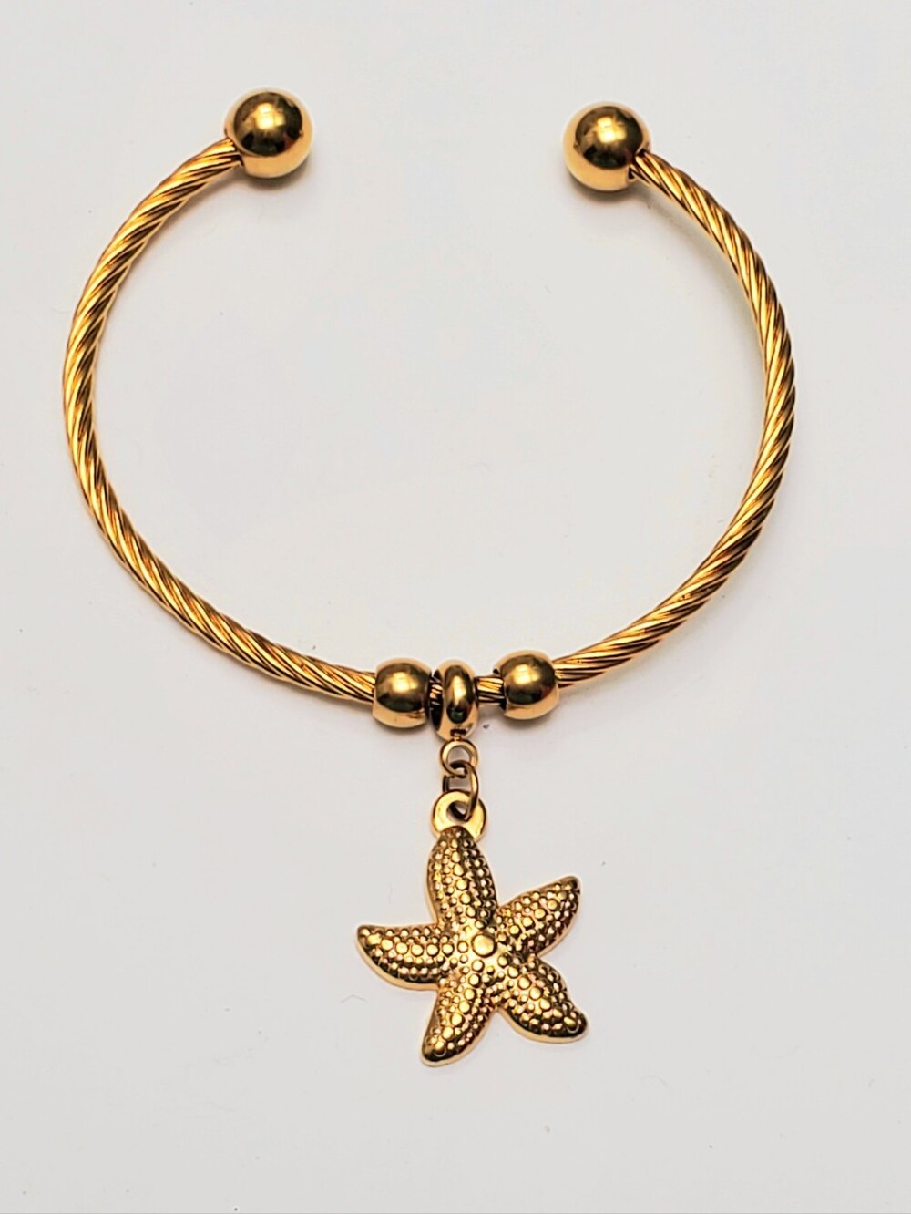 Goldtone Starfish Charm Bangle Bracelet